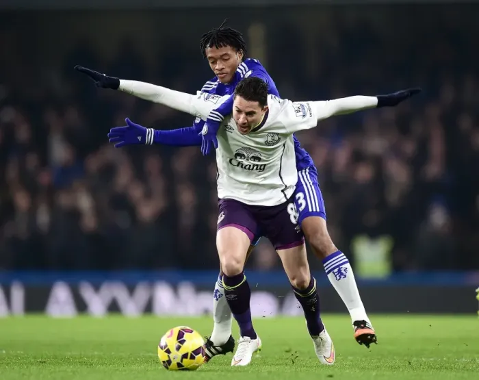 Framed Print : Intense Battle for Possession: Juan Cuadrado vs. Bryan Oviedo - A Premier League Showdown Framed Print : Intense Battle for Possession: Juan Cuadrado vs. Bryan Oviedo - A Premier League Showdown