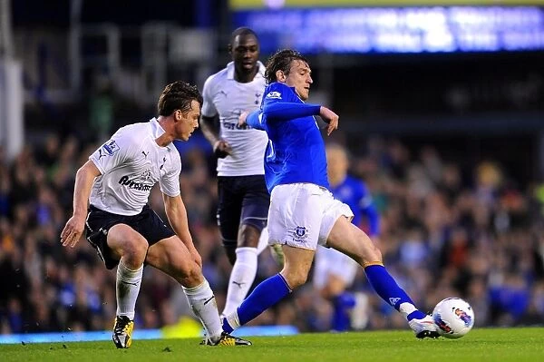 Intense Clash: Jelavic vs Parker at Goodison Park - Everton vs Tottenham, Barclays Premier League (10 March 2012)