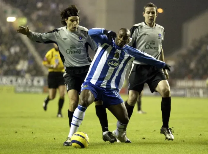 Framed Print : Intense Clash: Nuno Valente vs. Jason Roberts - A Footballing Battle on the Everton Field Framed Print : Intense Clash: Nuno Valente vs. Jason Roberts - A Footballing Battle on the Everton Field