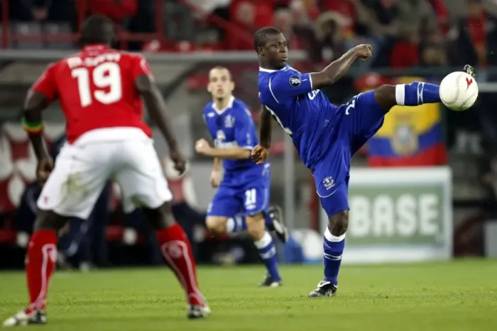 Framed Print : Intense Clash: Yakubu vs. Sarr - Standard Liege vs. Everton UEFA Cup First Round Framed Print : Intense Clash: Yakubu vs. Sarr - Standard Liege vs. Everton UEFA Cup First Round