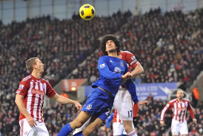 Framed Print : Intense Derby Showdown: Fellaini vs. Shawcross at Britannia Stadium (Everton vs. Stoke City, Barclays Premier League, 01 January 2011)