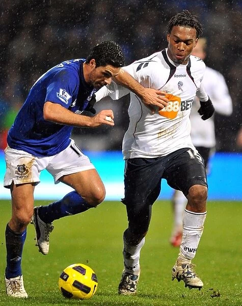 Intense Rivalry: Arteta vs. Sturridge Battle for Ball - Everton vs. Bolton Wanderers, Premier League (2011)