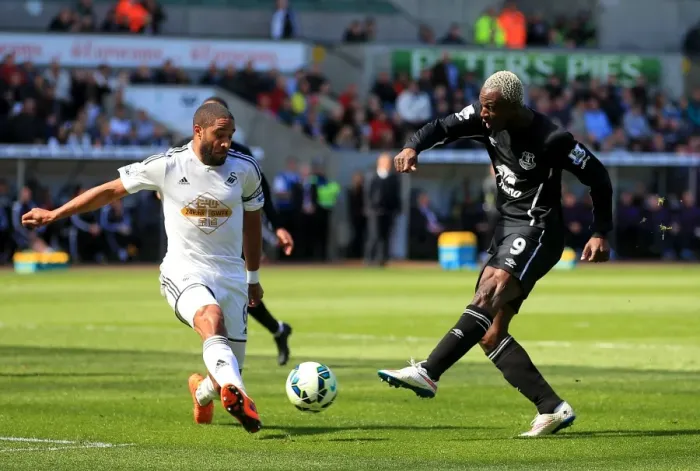 Framed Print : Intense Rivalry: Ashley Williams vs. Arouna Kone Battle at Swansea City's Liberty Stadium - Everton vs. Swansea City, Barclays Premier League