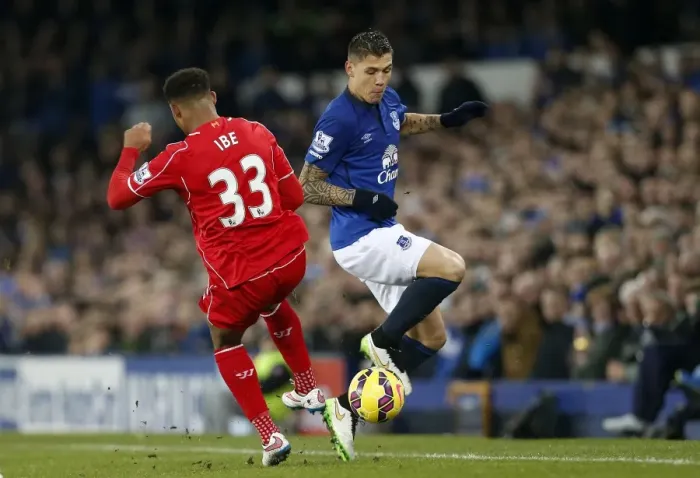 Framed Print : Intense Rivalry: Besic vs Ibe - The Battle for the Ball at Goodison Park