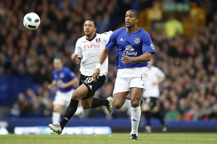 Framed Print : Intense Rivalry: Dembele vs. Distin - Everton vs. Fulham's Premier League Showdown at Goodison Park (19 March 2011) Framed Print : Intense Rivalry: Dembele vs. Distin - Everton vs. Fulham's Premier League Showdown at Goodison Park (19 March 2011)