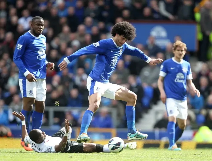 Framed Print : Intense Rivalry: Fellaini vs. Enoh at Goodison Park - Everton's Narrow 1-0 Victory over Fulham Framed Print : Intense Rivalry: Fellaini vs. Enoh at Goodison Park - Everton's Narrow 1-0 Victory over Fulham