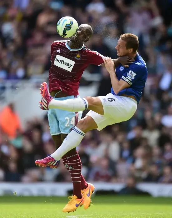 Framed Print : Intense Rivalry on the Field: Jagielka vs. Cole - West Ham United vs. Everton, Premier League