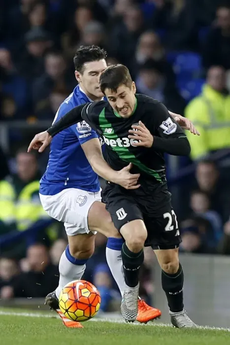 Framed Print : Intense Rivalry: Gareth Barry vs Bojan Krkic - Everton vs Stoke City's Battle for Ball Possession at Goodison Park