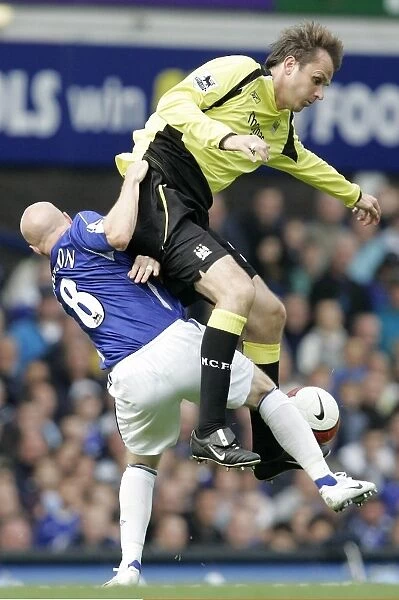 Intense Rivalry: Hamann vs. Johnson Clash at Goodison Park (Everton vs. Manchester City, Premiership 2006)