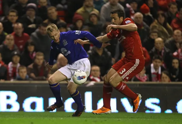 Framed Print : Intense Rivalry: Hibbert vs Enrique - Premier League Clash: Everton vs Liverpool (13 March 2012) Framed Print : Intense Rivalry: Hibbert vs Enrique - Premier League Clash: Everton vs Liverpool (13 March 2012)