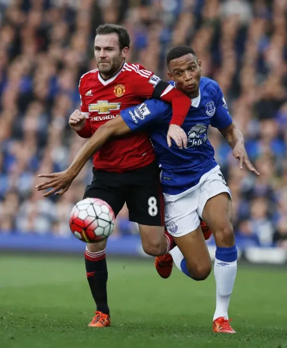 Framed Print : Intense Rivalry: Juan Mata vs Brendan Galloway - Everton vs Manchester United Battle for the Ball Framed Print : Intense Rivalry: Juan Mata vs Brendan Galloway - Everton vs Manchester United Battle for the Ball