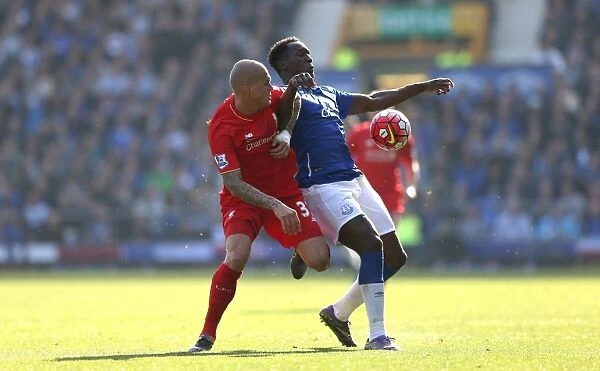 Intense Rivalry: Lukaku vs Skrtel - A Football Battle for Ball Supremacy at Goodison Park (Everton vs Liverpool)