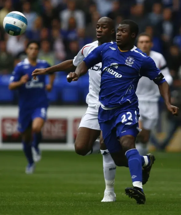 Framed Print : Intense Rivalry: Meite vs Yakubu Battle at The Reebok Stadium (01 / 09 / 07) Framed Print : Intense Rivalry: Meite vs Yakubu Battle at The Reebok Stadium (01 / 09 / 07)
