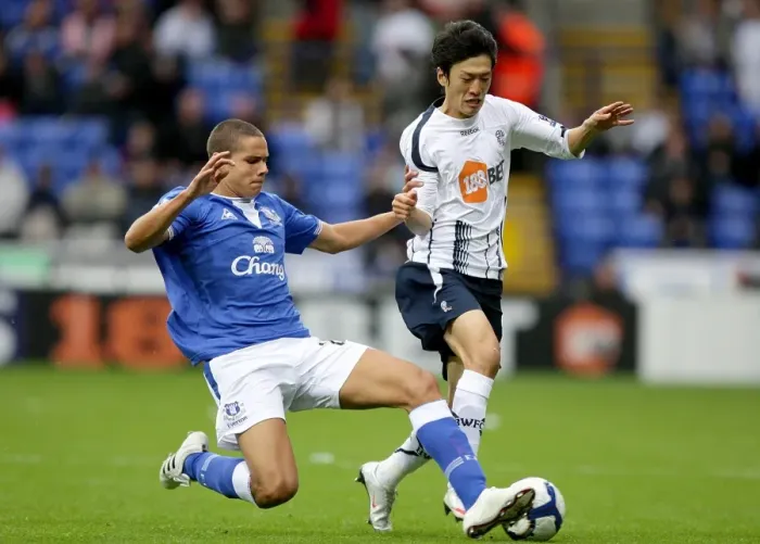Framed Print : Intense Rivalry: Rodwell vs. Lee - Everton vs. Bolton Wanderers, Premier League Battle for Possession Framed Print : Intense Rivalry: Rodwell vs. Lee - Everton vs. Bolton Wanderers, Premier League Battle for Possession