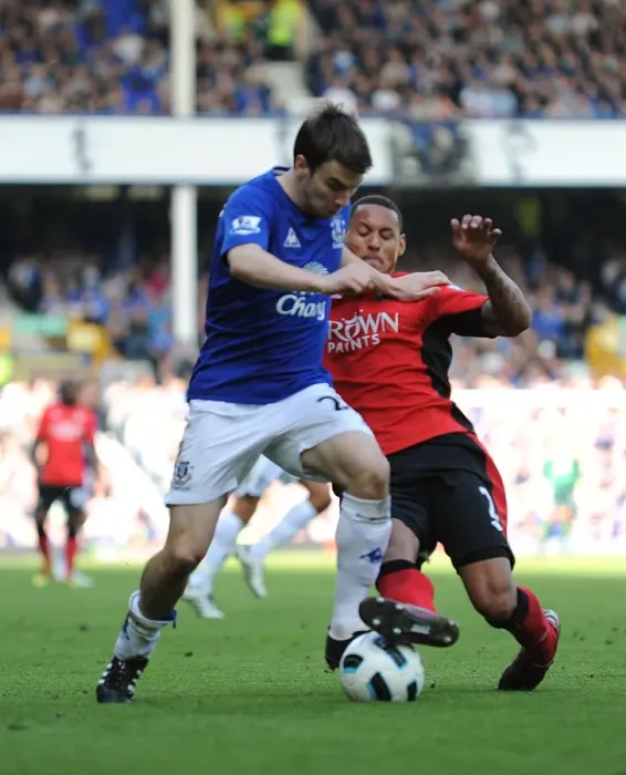 Framed Print : Intense Rivalry: Seamus Coleman vs. Jermaine Jones - A Battle for Ball Possession, Everton vs. Blackburn Rovers (16 April 2011, Goodison Park)