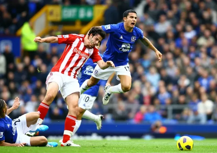 Framed Print : Intense Rivalry: Tim Cahill vs. Marc Wilson - Everton vs. Stoke City's Fierce Battle for Possession Framed Print : Intense Rivalry: Tim Cahill vs. Marc Wilson - Everton vs. Stoke City's Fierce Battle for Possession