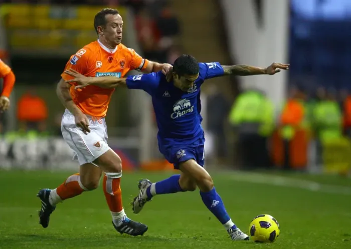 Framed Print : Intense Rivalry: Tim Cahill vs. Charlie Adam - Everton vs. Blackpool, Premier League Battle on Bloomfield Road Framed Print : Intense Rivalry: Tim Cahill vs. Charlie Adam - Everton vs. Blackpool, Premier League Battle on Bloomfield Road