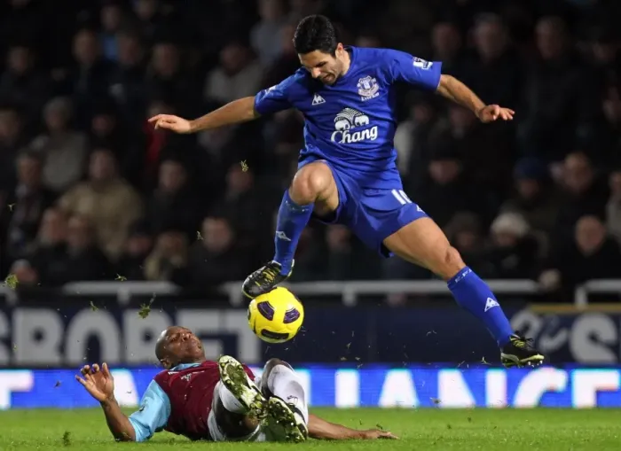 Framed Print : Intense Tackle: Mike Arteta vs. Luis Boa Morte - Barclays Premier League Clash at Upton Park (26 December 2010) Framed Print : Intense Tackle: Mike Arteta vs. Luis Boa Morte - Barclays Premier League Clash at Upton Park (26 December 2010)