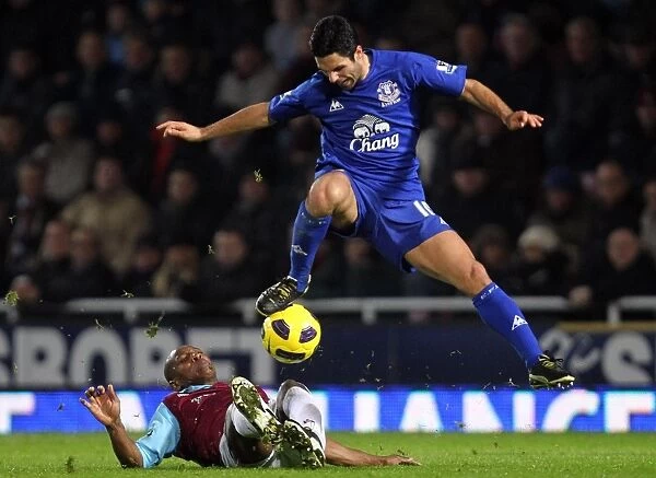 Intense Tackle: Mike Arteta vs. Luis Boa Morte - Barclays Premier League Clash at Upton Park (26 December 2010)