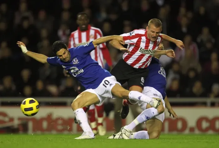 Framed Print : Jagielka and Arteta's Overpowering Sandwich: Everton's Victory Over Sunderland's Cattermole (BPL 2010) Framed Print : Jagielka and Arteta's Overpowering Sandwich: Everton's Victory Over Sunderland's Cattermole (BPL 2010)