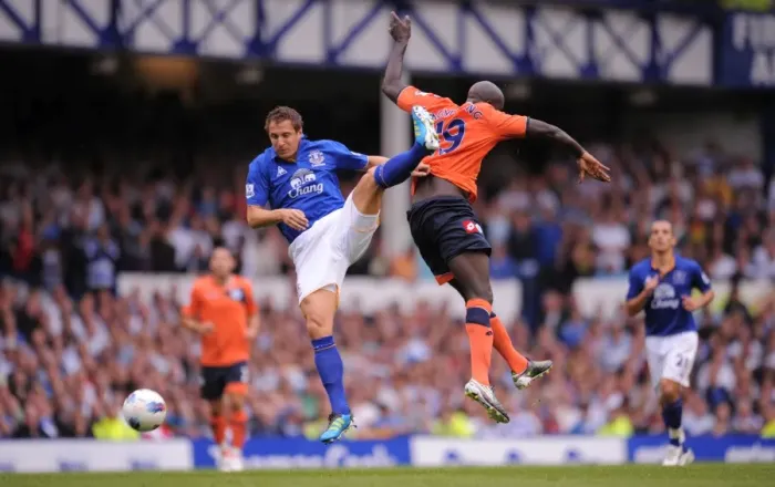 Framed Print : Jagielka vs. Agyemang: A Battle at Goodison Park - Everton vs. Queens Park Rangers, Barclays Premier League (2011)
