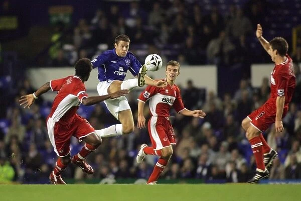 James Beattie. Bettie is first to the ball in amongst a trio of defenders