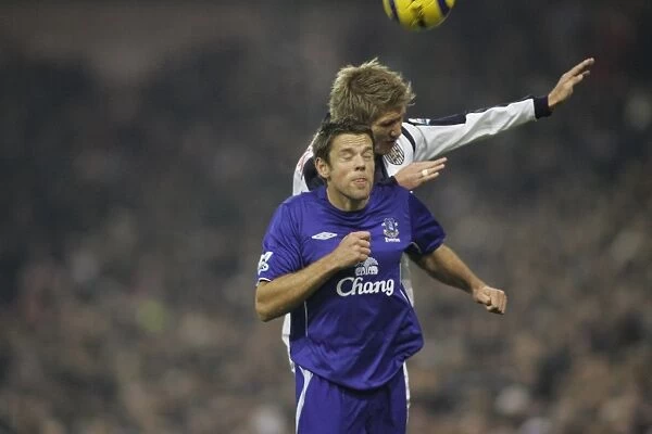 James Beattie challenges for the ball