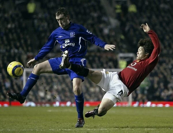 James McFadden's Unyielding Control: Holding His Ground Against Ji Sung Park's Challenges