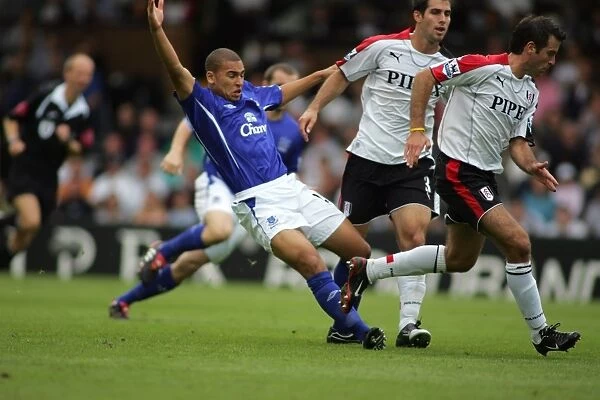 James Vaughan loses out to two Fulham defenders