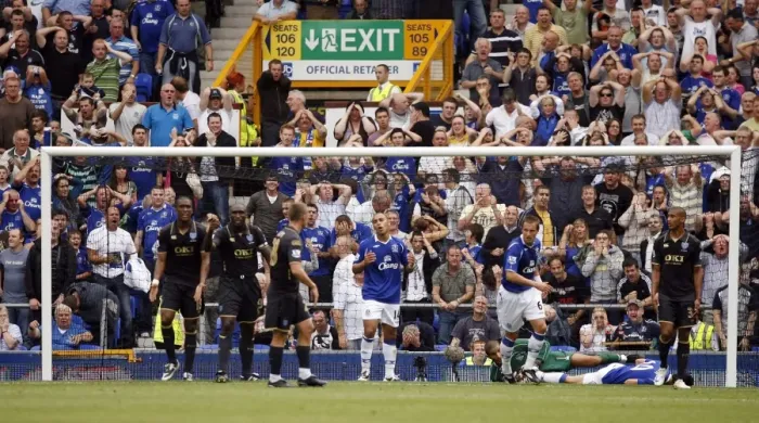 Framed Print : James Vaughan's Disappointment: Everton's Loss to Portsmouth in Barclays Premier League