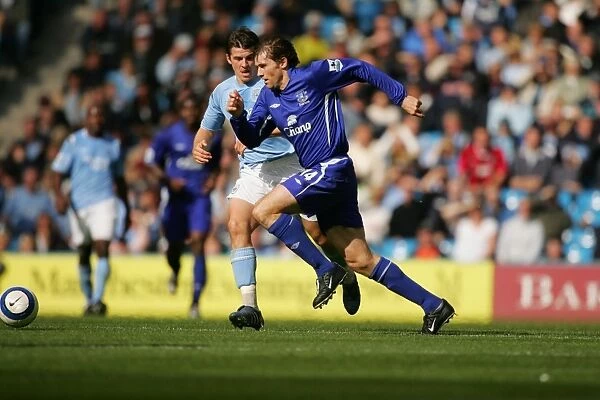 Kevin Kilbane. Kilbane tries to outpace the City defence