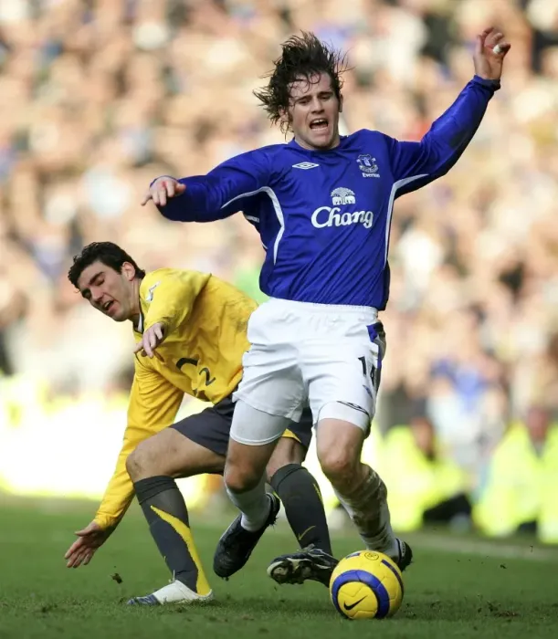 Framed Print : Kevin Kilbane vs Jose Antonio Reyes: A Footballing Battle - Kilbane Fouled by Reyes