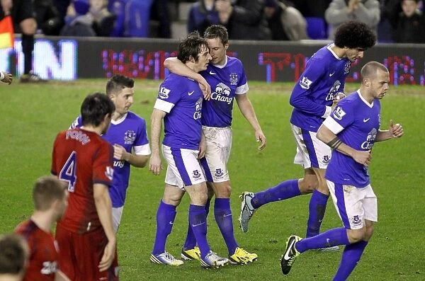 Leighton Baines Scores Penalty, Celebrates with Jagielka: Everton's Victory Moment vs. West Bromwich Albion (30-01-2013)