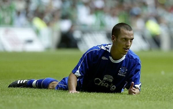 Leon Osman lays on the ground during the match Mandatory Credit