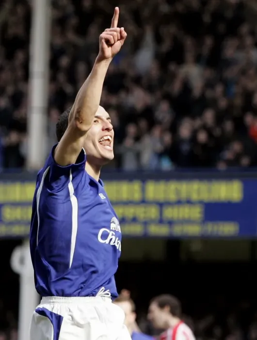 Framed Print : Leon Osman Scores the Opener: Everton's Thrilling Victory Moment Framed Print : Leon Osman Scores the Opener: Everton's Thrilling Victory Moment