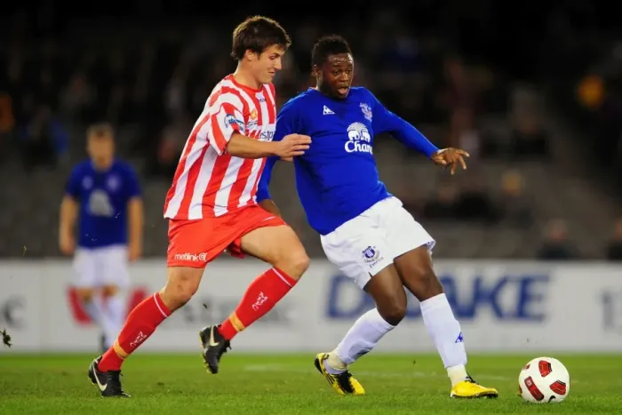 Framed Print : Magaye Gueye vs. Michael Marrone: A Tight Battle for Possession