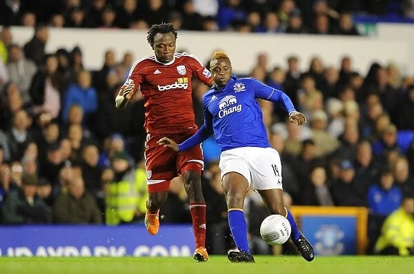 Magaye Gueye vs. Somen Tchoyi: A Football Battle for the Carling Cup Ball at Goodison Park (Everton vs. West Bromwich Albion, 21 September 2011)