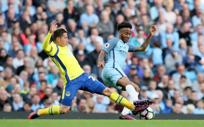 Framed Print : Manchester City vs. Everton: Bryan Oviedo vs. Raheem Sterling - Intense Battle for Ball Possession (Premier League) Framed Print : Manchester City vs. Everton: Bryan Oviedo vs. Raheem Sterling - Intense Battle for Ball Possession (Premier League)
