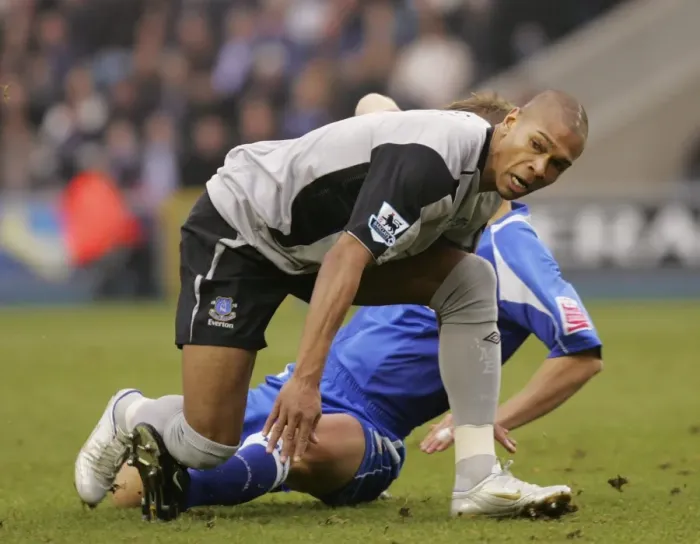 Framed Print : Marcus Bent Foul: Everton Football Club's Star Forced to the Ground