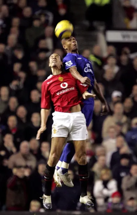 Framed Print : Marcus Bent Soars Over Rio Ferdinand: An Epic Football Moment Framed Print : Marcus Bent Soars Over Rio Ferdinand: An Epic Football Moment