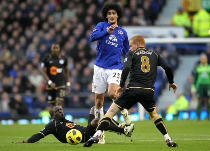 Framed Print : Marouane Fellaini in Action: Everton vs. Wigan Athletic (11 December 2010, Goodison Park) - A Battle Against Hendry Thomas and Ben Watson