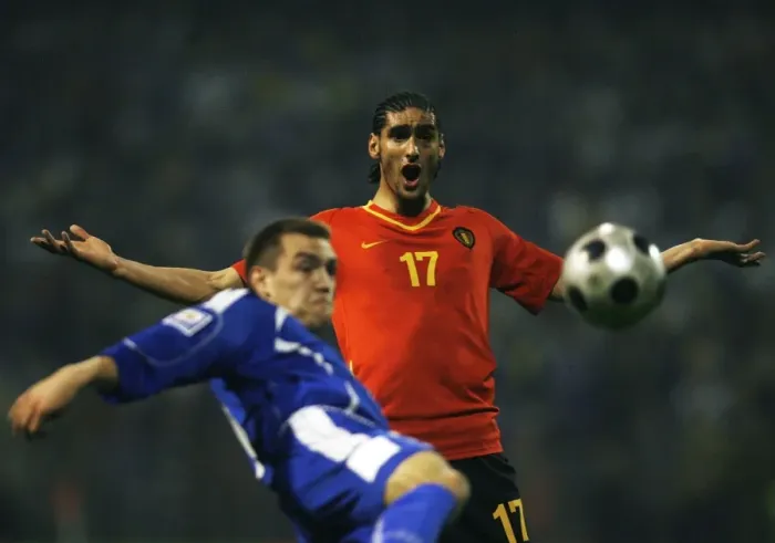 Framed Print : Marouane Fellaini-Bakkioui of Belgium reacts as Boris Pandza of Bosnia kicks the ball during their World Cup 2010 qualifying soccer match in Zenica Framed Print : Marouane Fellaini-Bakkioui of Belgium reacts as Boris Pandza of Bosnia kicks the ball during their World Cup 2010 qualifying soccer match in Zenica