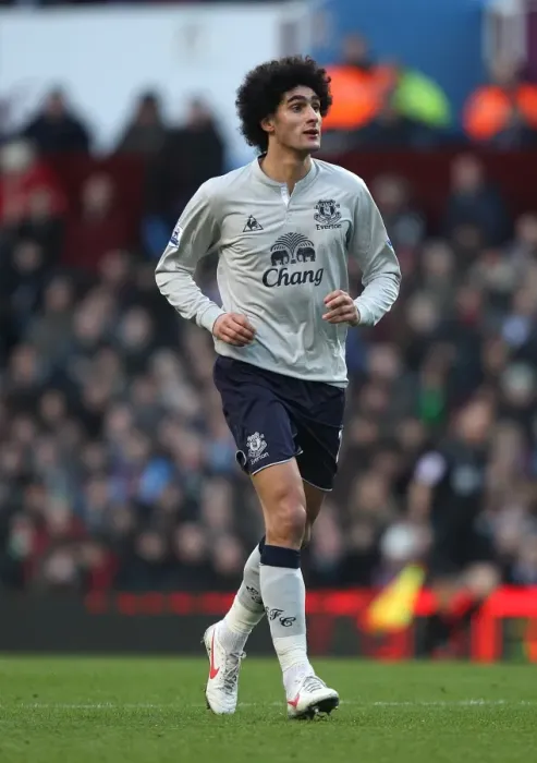 Framed Print : Marouane Fellaini: Everton's Midfield Maestro in the Thrilling Rivalry against Aston Villa (14 January 2012) Framed Print : Marouane Fellaini: Everton's Midfield Maestro in the Thrilling Rivalry against Aston Villa (14 January 2012)
