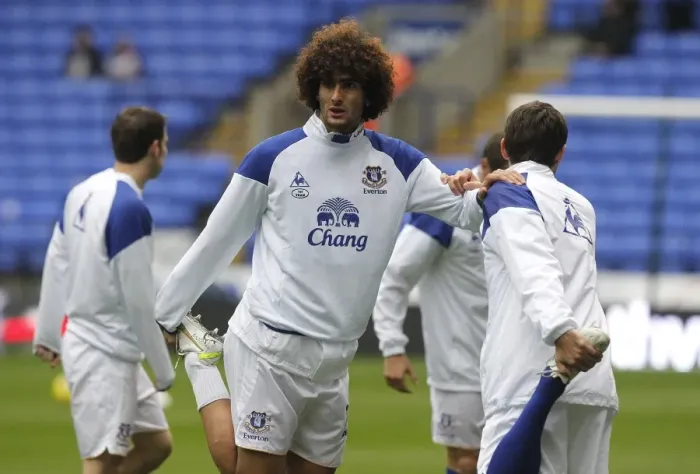 Framed Print : Marouane Fellaini's Focused Warm-Up Ahead of Bolton Wanderers vs Everton (November 26, 2011)