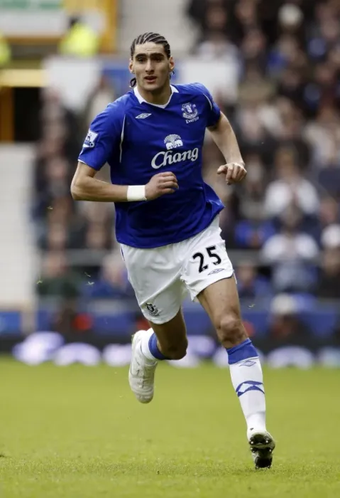 Framed Print : Marouane Fellaini's Thrilling Performance: Everton vs Stoke City, Barclays Premier League, March 14, 2009