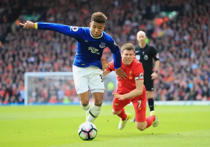 Framed Print : Mason Holgate vs. James Milner: Intense Rivalry at Anfield - Premier League: Liverpool vs. Everton Framed Print : Mason Holgate vs. James Milner: Intense Rivalry at Anfield - Premier League: Liverpool vs. Everton