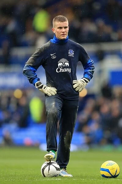 Mason Springthorpe in Deep Thought: Everton Goalkeeper's Contemplative Moment Before FA Cup Quarterfinal vs. Wigan Athletic (Everton 0-3, March 9, 2013)