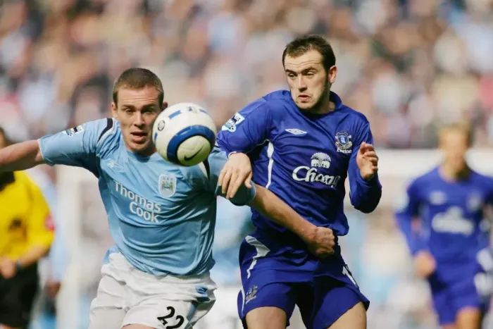 Framed Print : McFadden vs. Dunne: A Footballing Battle - Everton Rivals Clash Framed Print : McFadden vs. Dunne: A Footballing Battle - Everton Rivals Clash