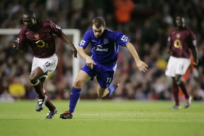Framed Print : McFadden vs. Toure: A Football Showdown at Everton - Race for Possession