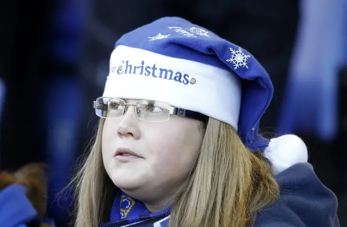 Framed Print : A Merry Everton Christmas: Everton FC vs West Bromwich Albion (2010) - Fan in Holiday Spirit at Goodison Park